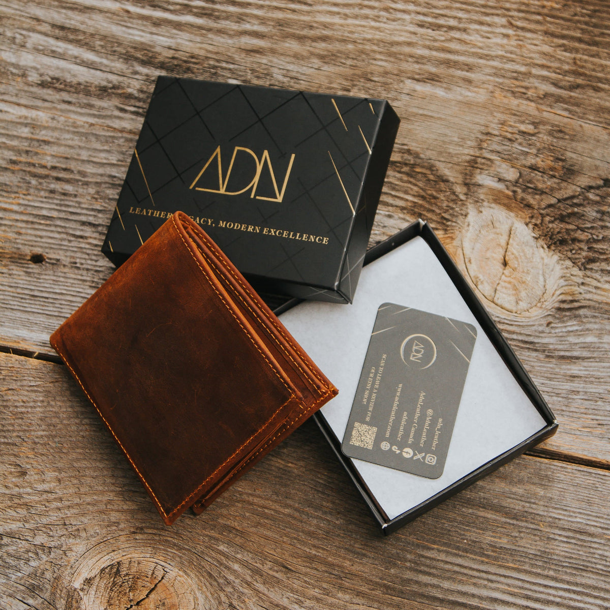 Engraved leather wallet in an ADN Leather gift box with a business card