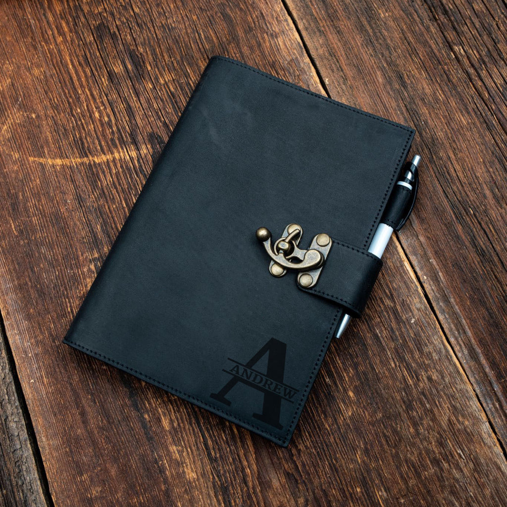 Black leather notebook with pen holder