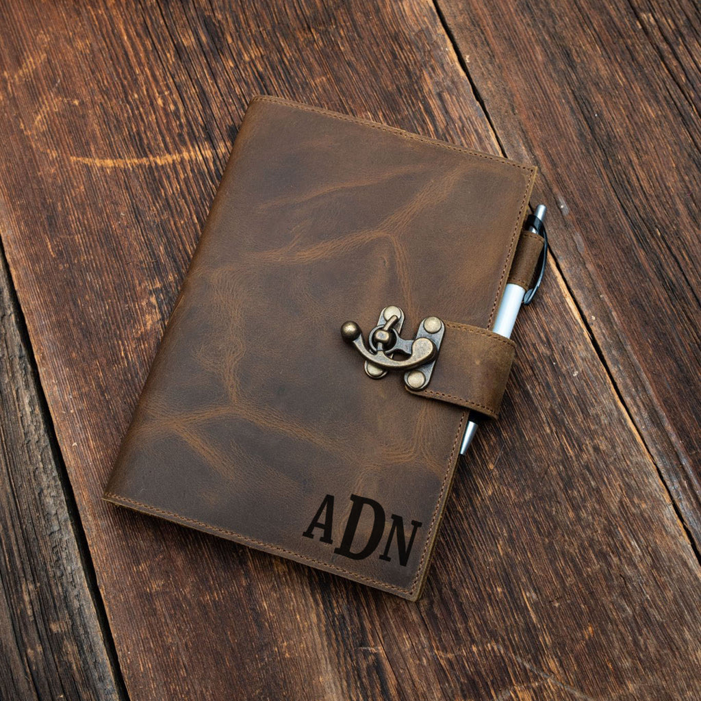Brown leather notebook with pen holder