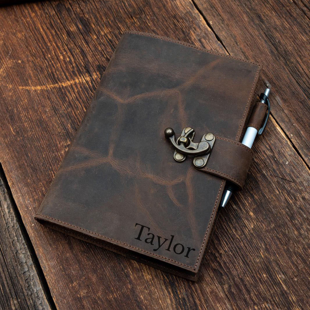 Brown leather notebook with pen holder