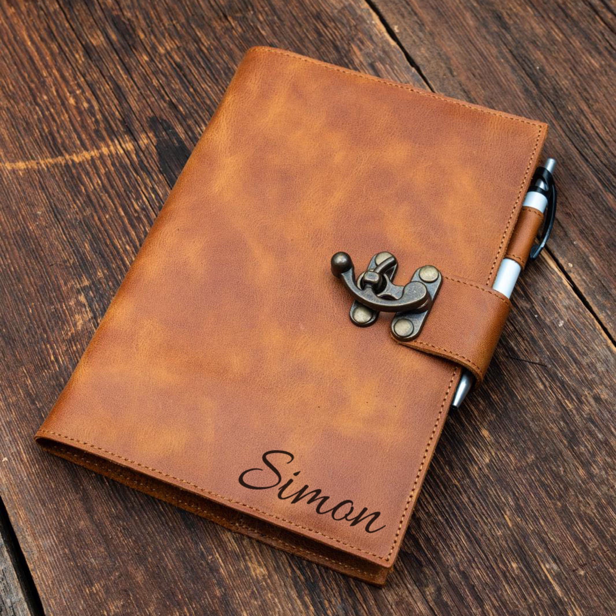 Light brown leather notebook with pen holder