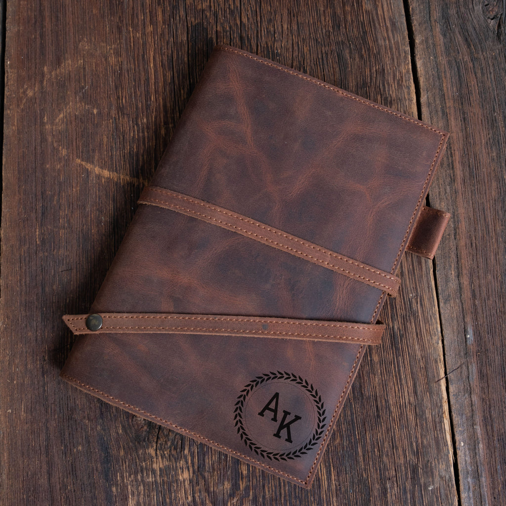 Brown leather notebook with monogram 