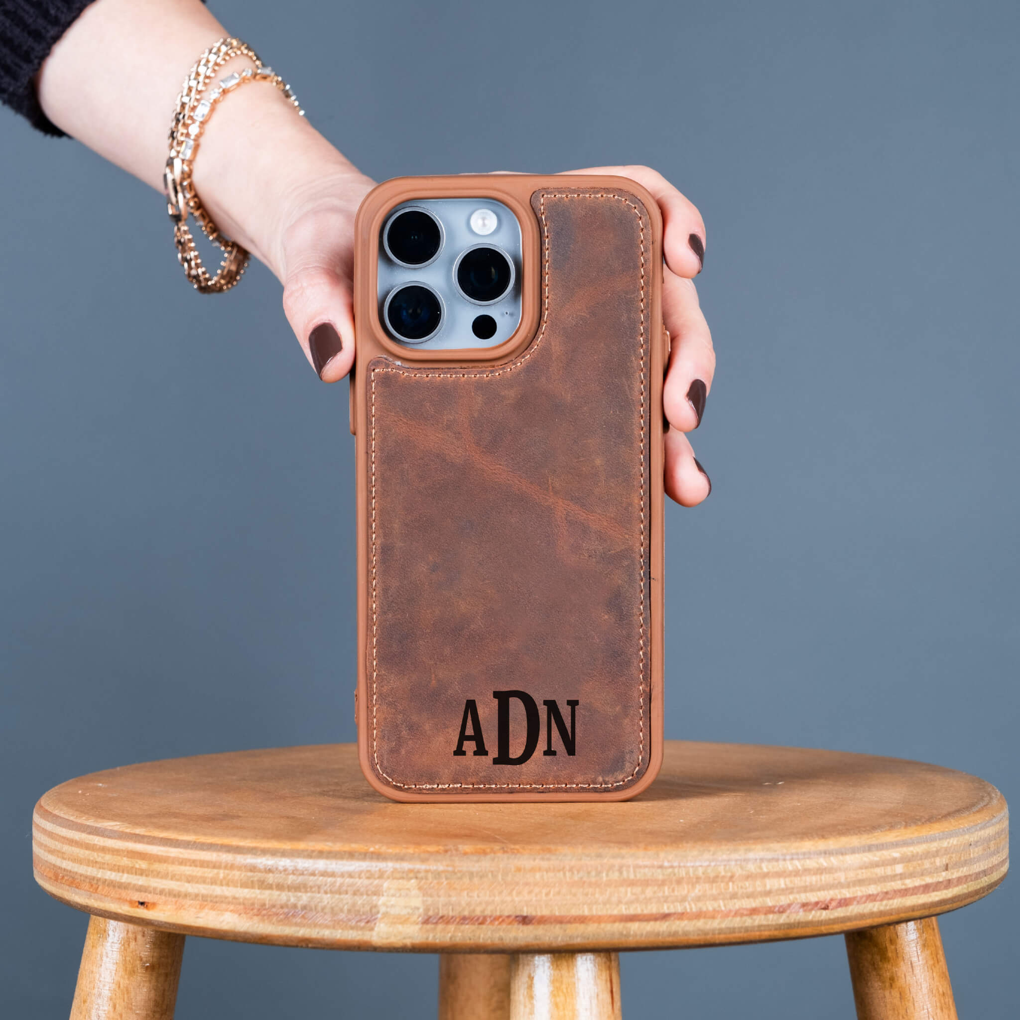Brown leather phone case with initials