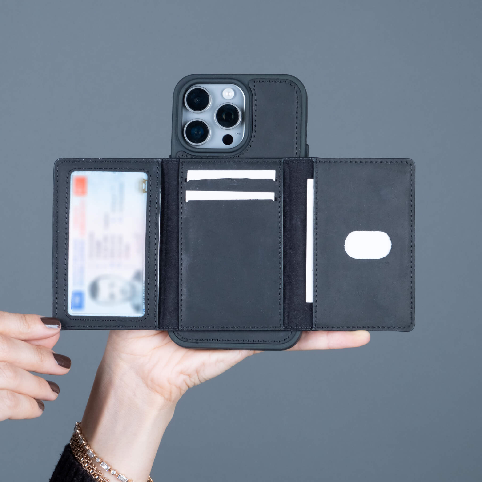 Black leather phone case with a wallet