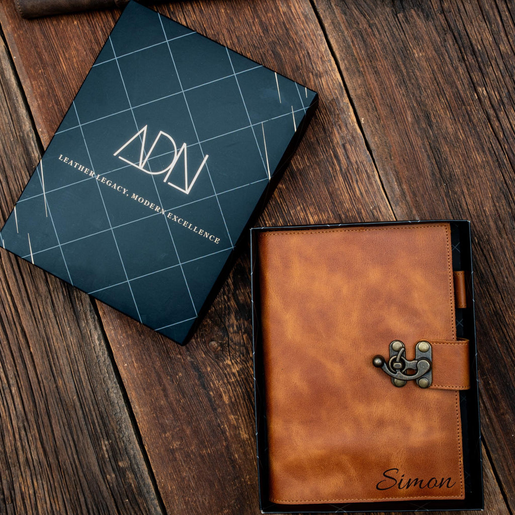 Brown leather notebook with pen holder