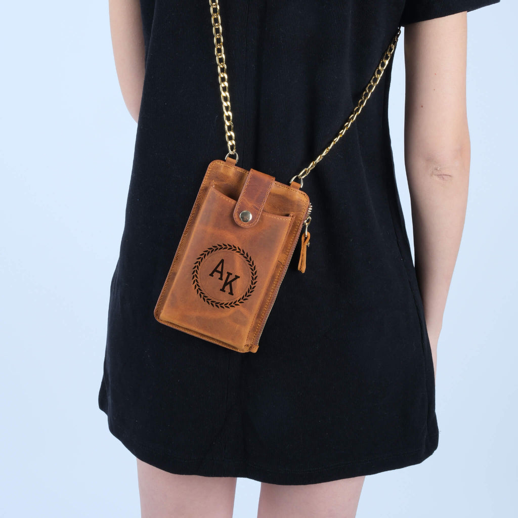  a brown leather phone pouch