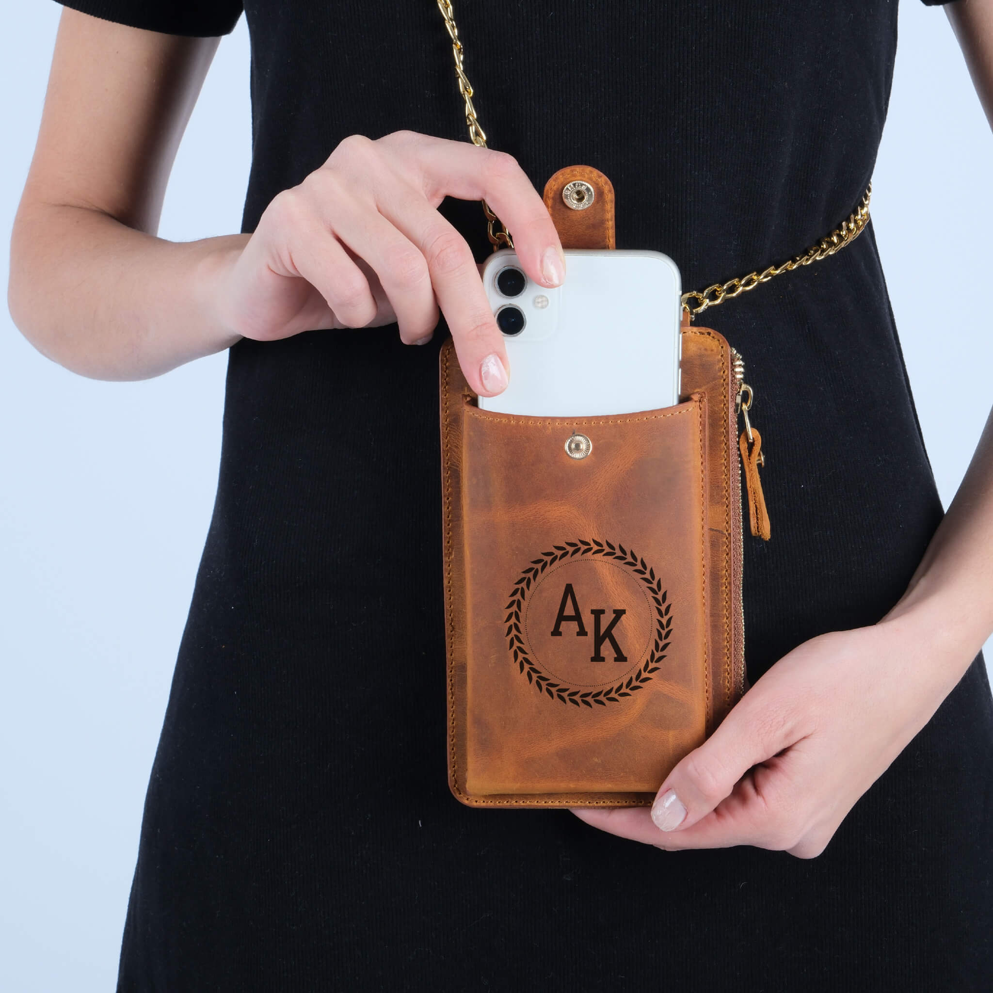  a brown leather phone pouch