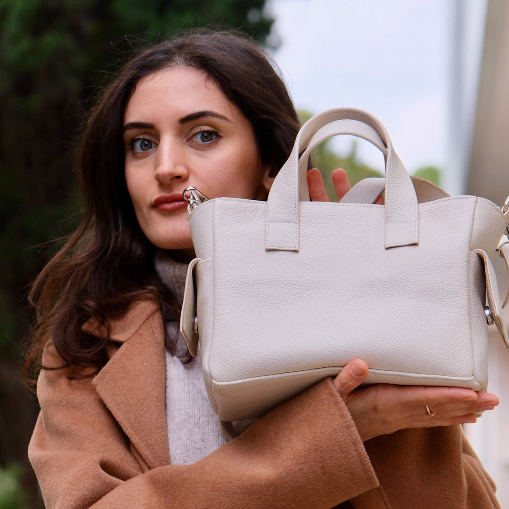 white leather handbag