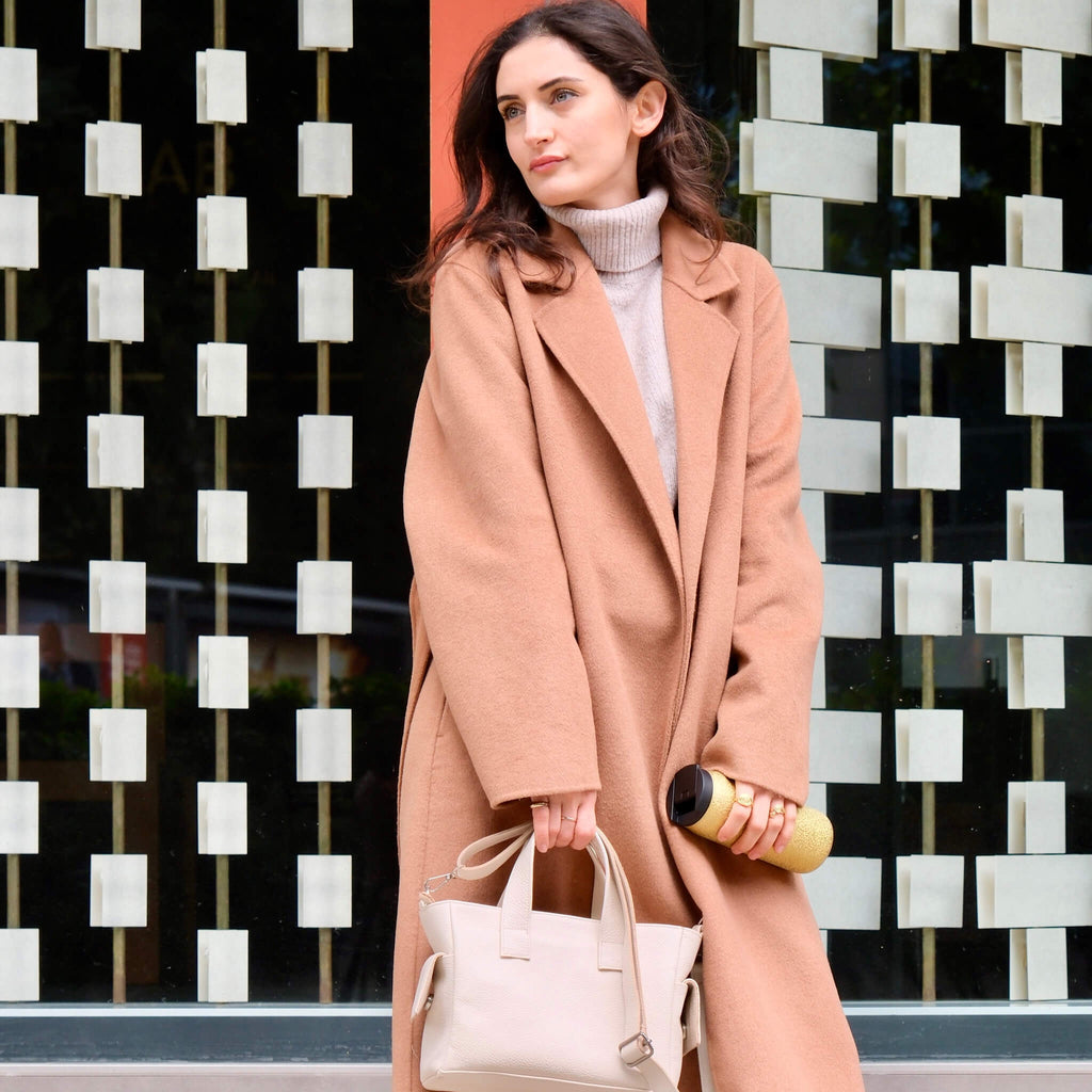 white leather handbag